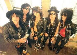 L.A. Guns-I Wanna Be Your Man (lyrics)